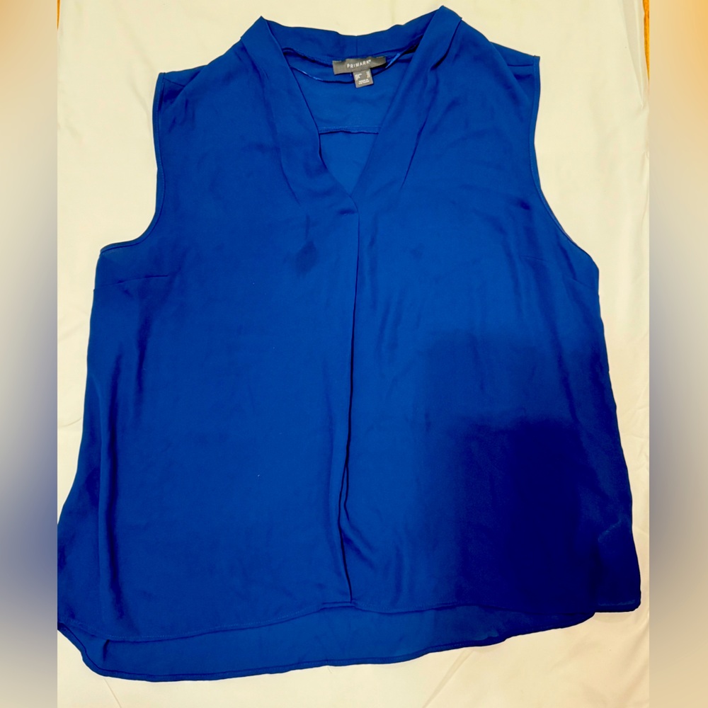 Blue women’s blouse, barely worn in mint condition